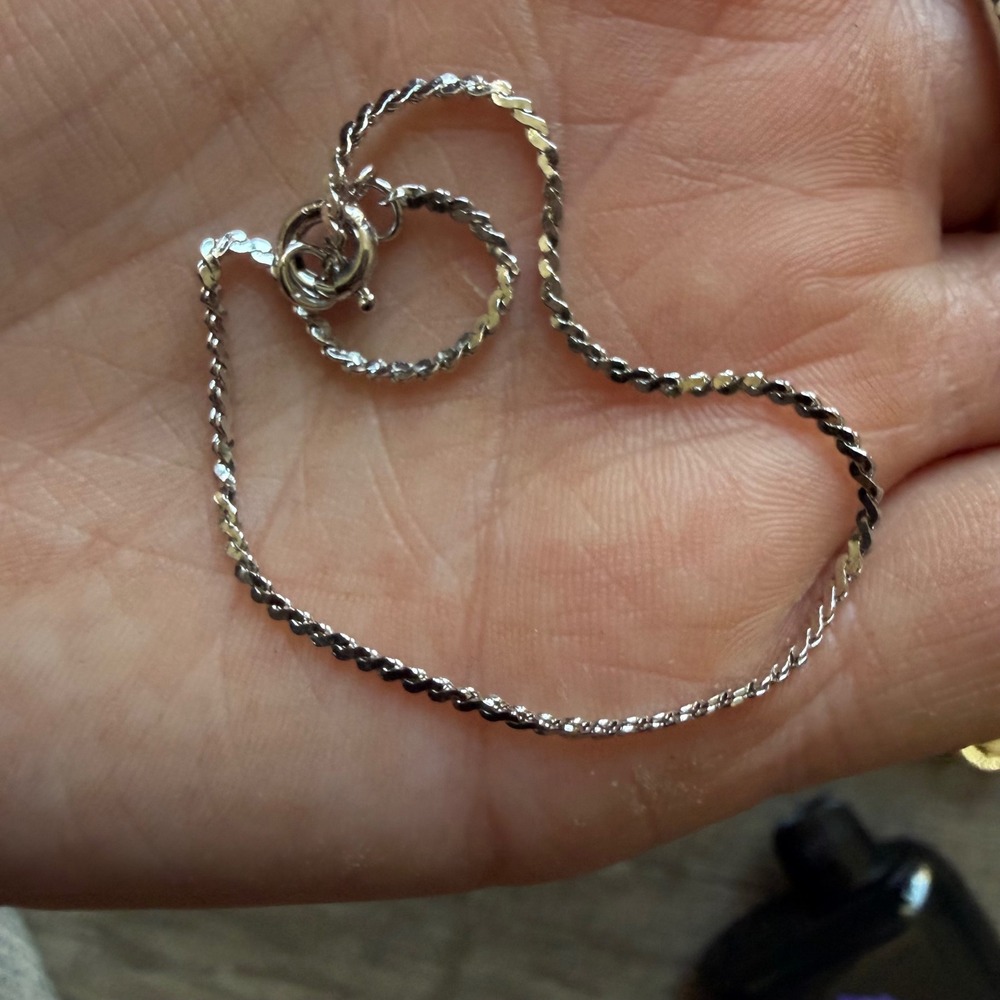Avon Silver Tone Twisted Rope Chain Bracelet